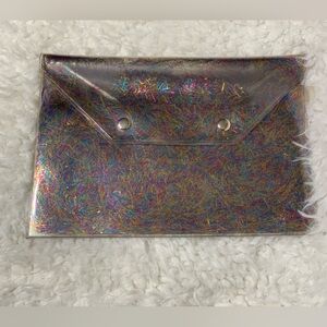 See thru clutch purse with multi color stripes throughout